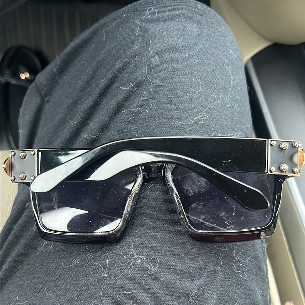 Stylish Black Sunglasses with Gold Accents